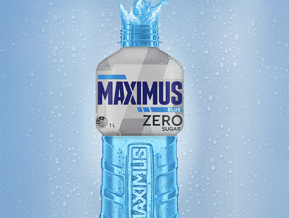 A bottle of Maximus Zero with water droplets in the background