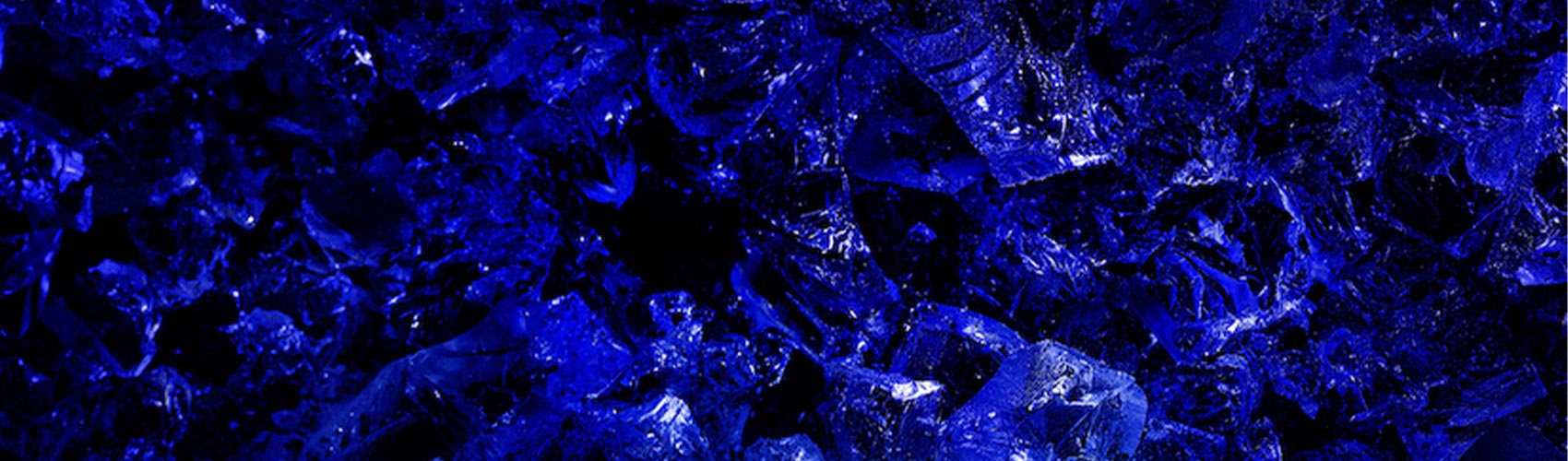 A blue and black textured background resembling ice.