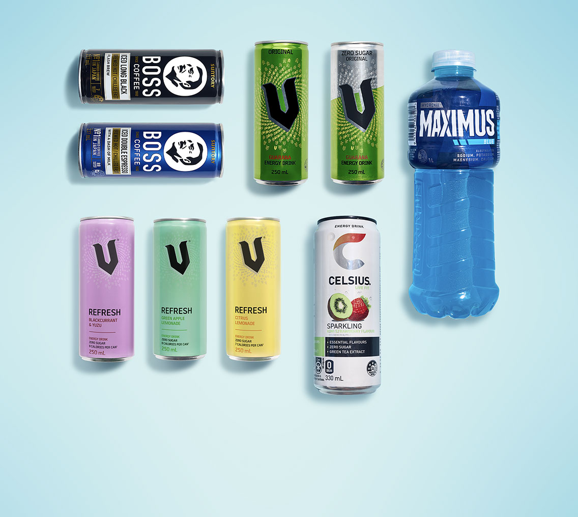 Top view of Boss, V Energy, Celcius and Maximus bottles and can on a light blue background